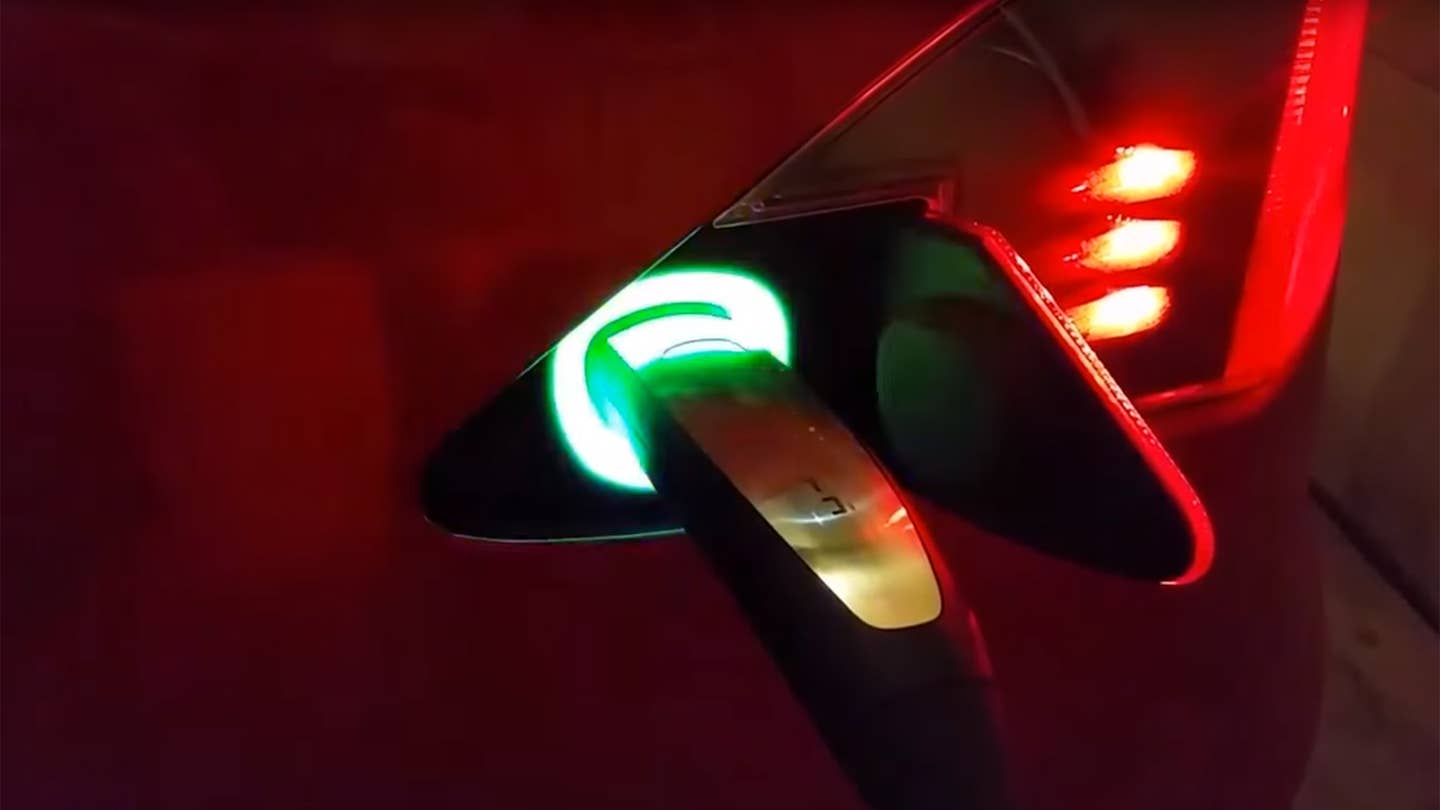 Tesla Has a Flashing Rainbow Light Hidden in its Charge Ports