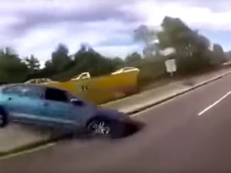 Watch This Car Crash When a Woman Pulls the Handbrake on Her Racing Boyfriend