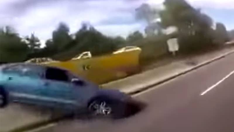 Watch This Car Crash When a Woman Pulls the Handbrake on Her Racing Boyfriend