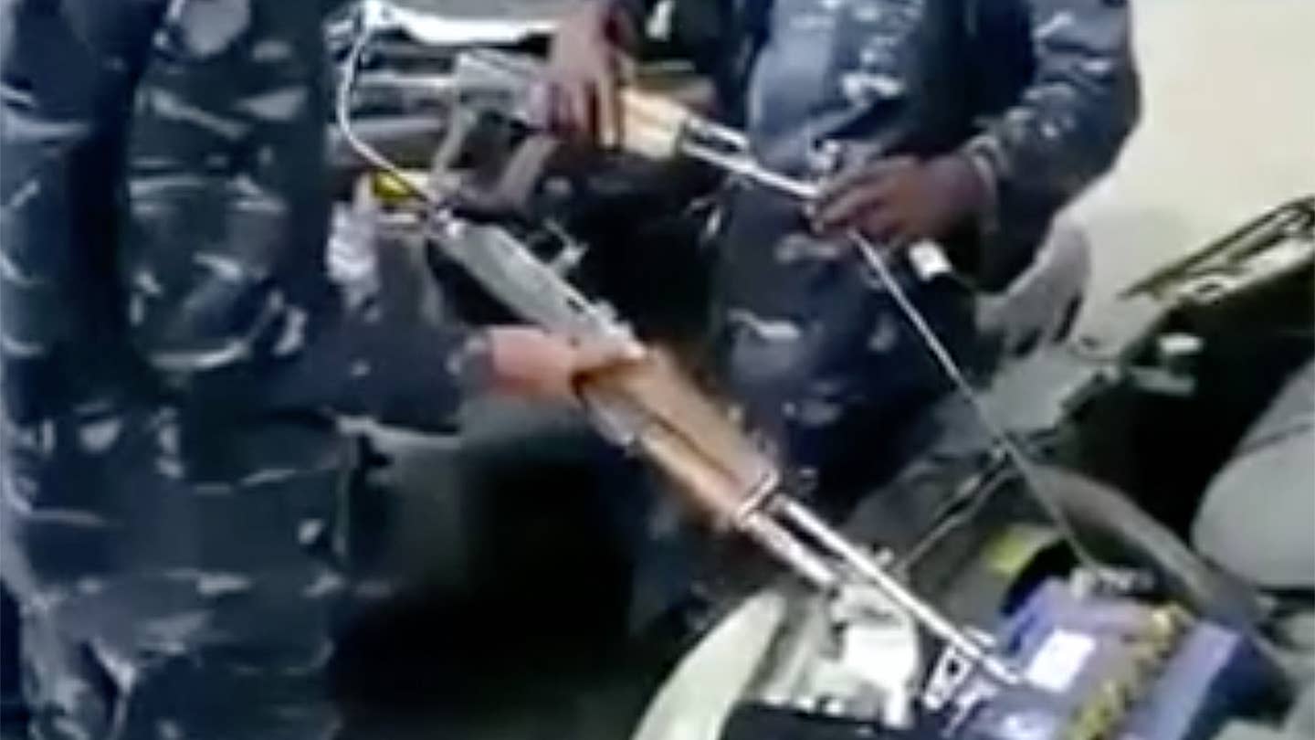 Watch These Guys Jump-Start a Car With AK-47s