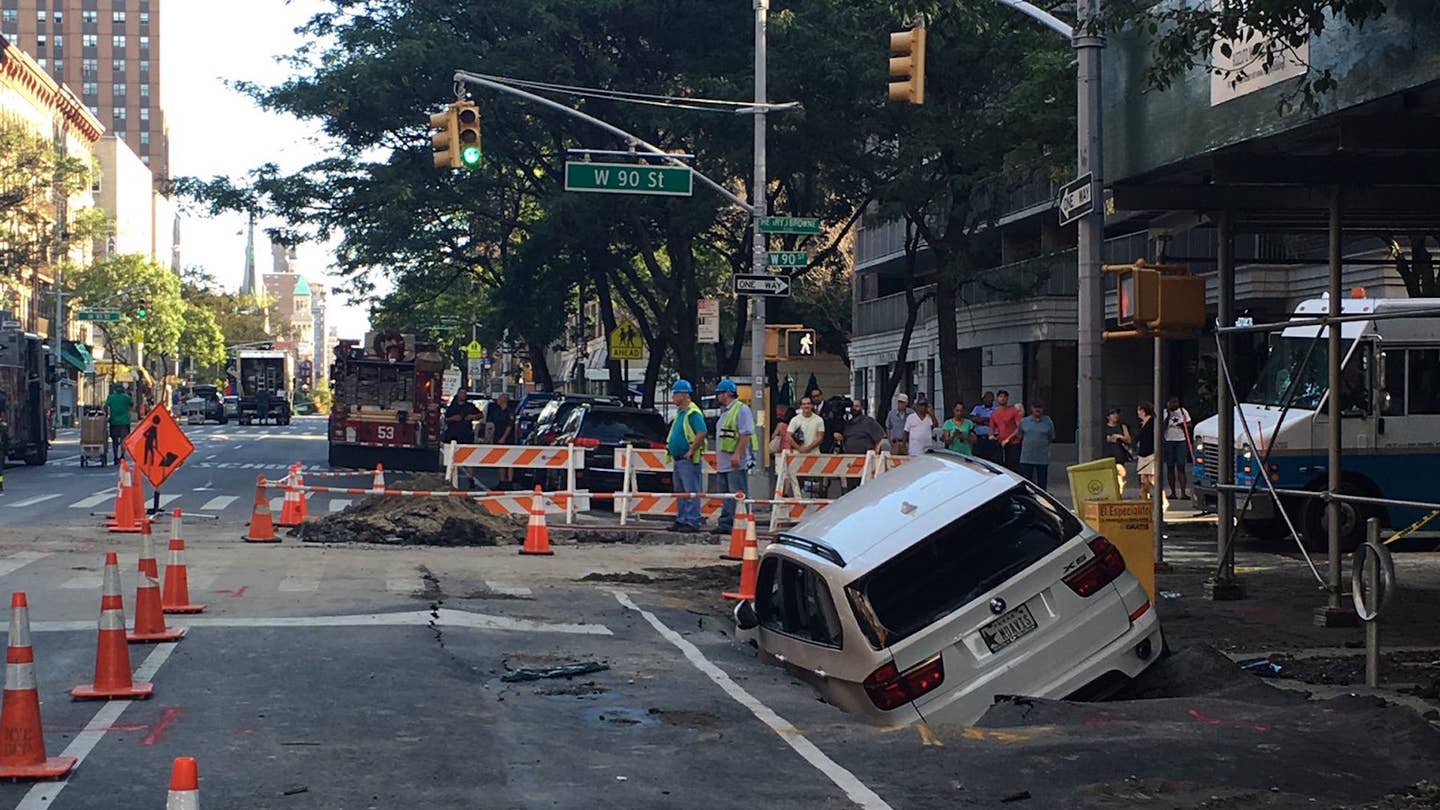 A Sinkhole Just Ate a BMW X5 in New York City