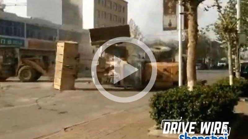Drive Wire: Watch Six Bulldozers Battle On The Street