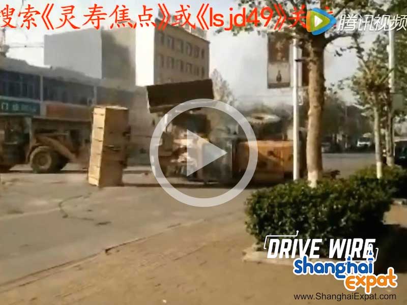 Drive Wire: Watch Six Bulldozers Battle On The Street