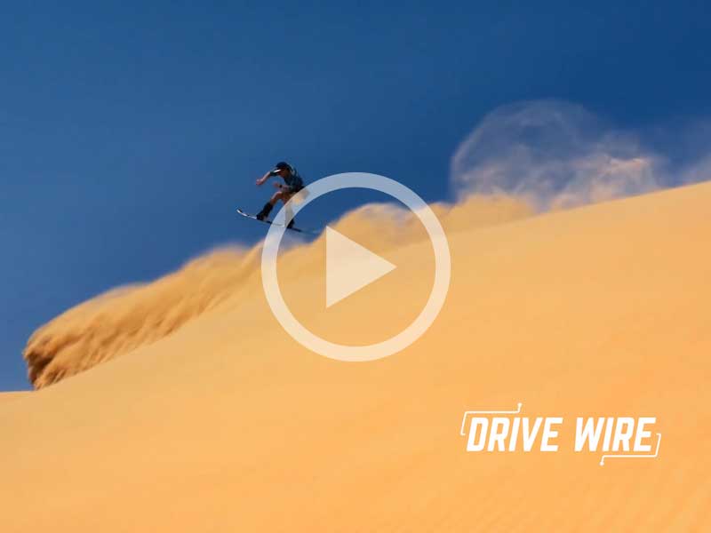 Drive Wire: Desert Snowboarding Off A Dakar Rally Car Is Glorious