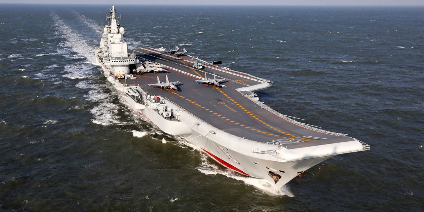 China&#8217;s Carrier Ties Up At Specially-Built Giant Dock In S. China Sea
