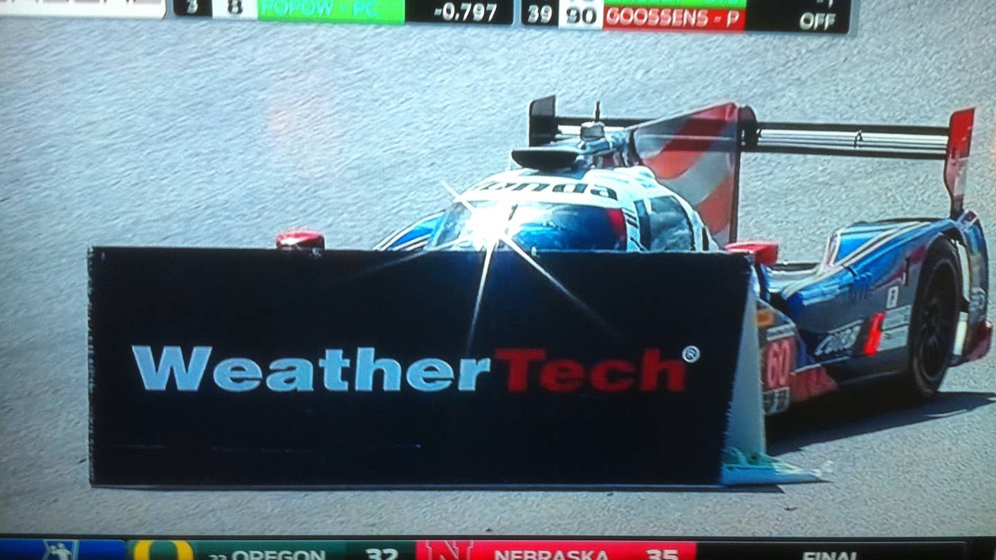 Well, This Is Embarassing: IMSA Driver Pushes WeatherTech Sign Around Like a Snowplow
