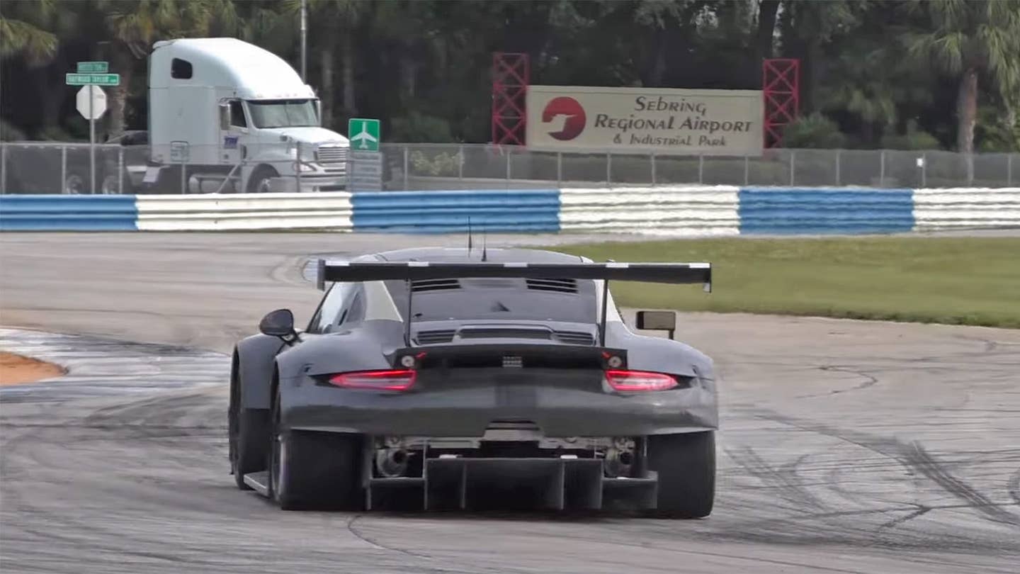 Watch Porsche’s Mysterious Mid-Engined 911 Race Car Attack the Track