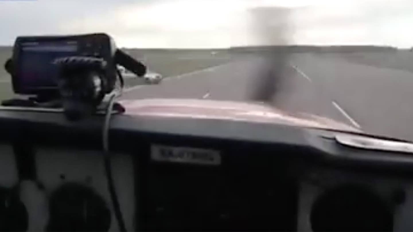 Watch a Russian Driver Nearly Crash Into This Landing Plane