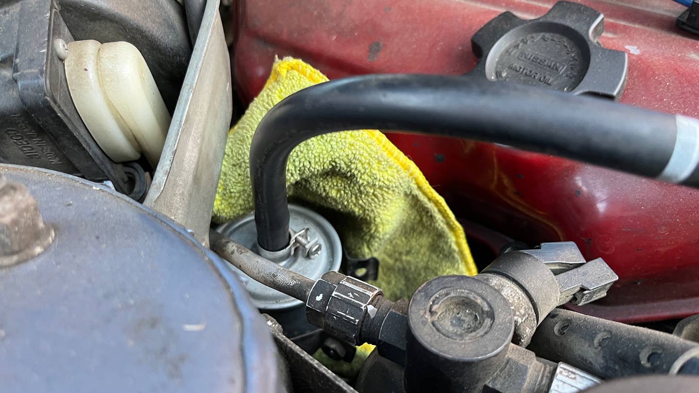 The fuel filter on a Z31 Nissan 300ZX is pretty easy to access. <i>Andrew P. Collins</i>