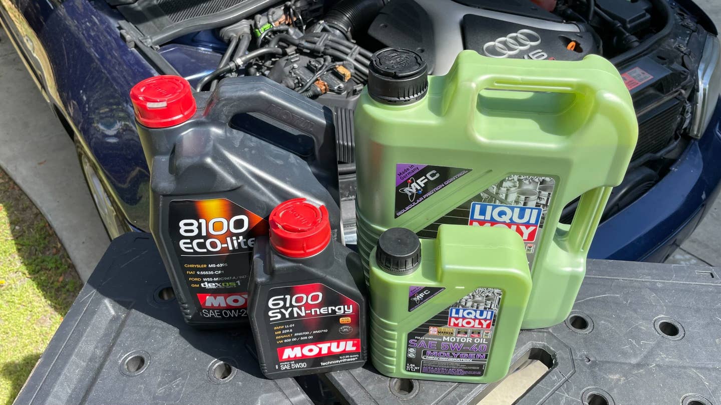 A couple jugs of synthetic oil.
