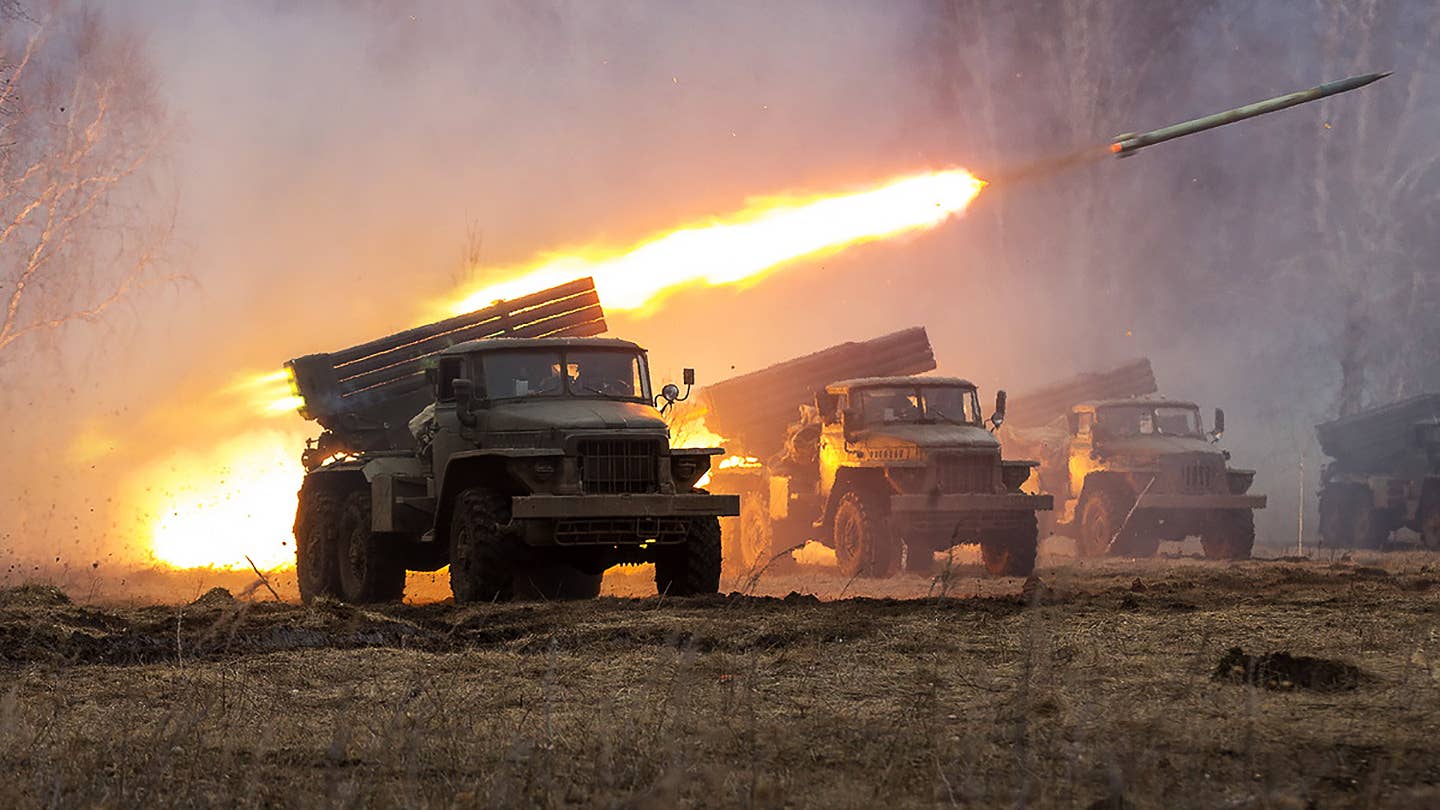 A BM-21 Grad rocket artillery launcher fires an 122mm rocket.