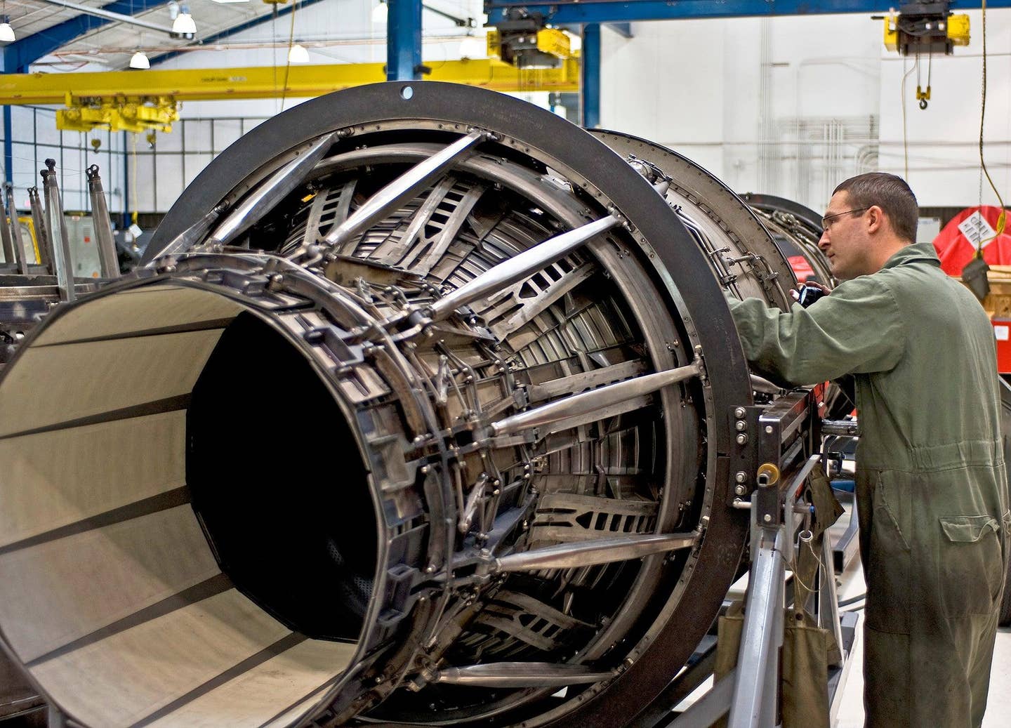 A maintainer from the 7th Component Maintenance Squadron inspects the outer components of a General Electric F101 turbofan engine from a B-1B Lancer.&nbsp;<em>USAF</em>