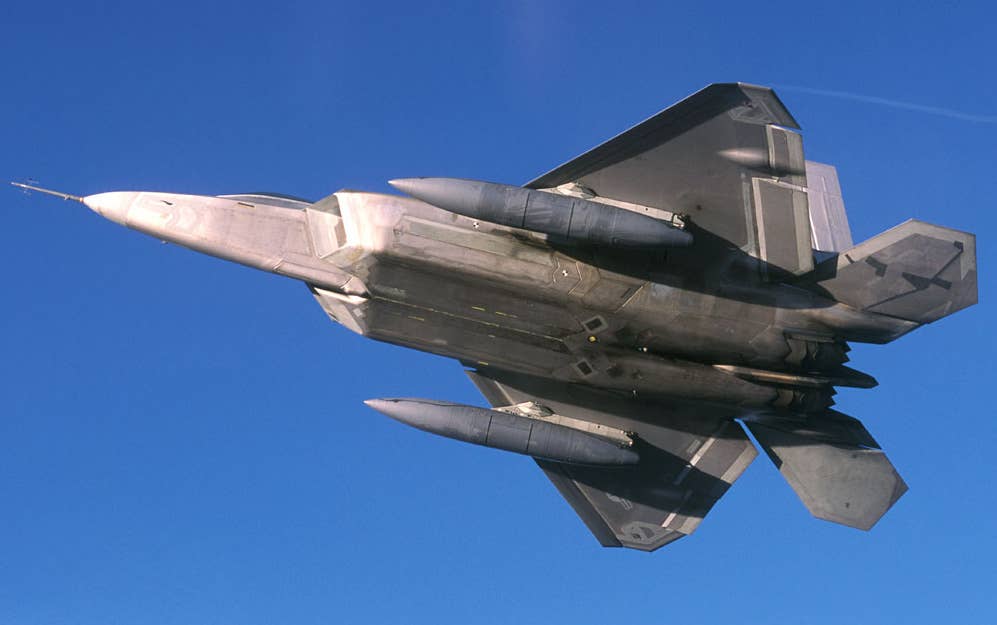 F-22 with its fuel tanks and pylons during testing.