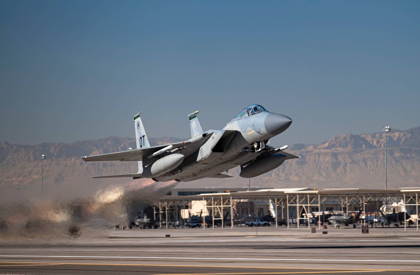 An F-15C Eagle takes off to conduct its final defensive counter-air vul during Weapons School Integration 21-B at Nellis Air Force Base, Nevada, last December 2021. As part of the drawdown of the F-15C/D, this was the final F-15C Weapons Instructor Course to be taught at the United States Air Force Weapons School. <em>U.S. Air Force photo</em>