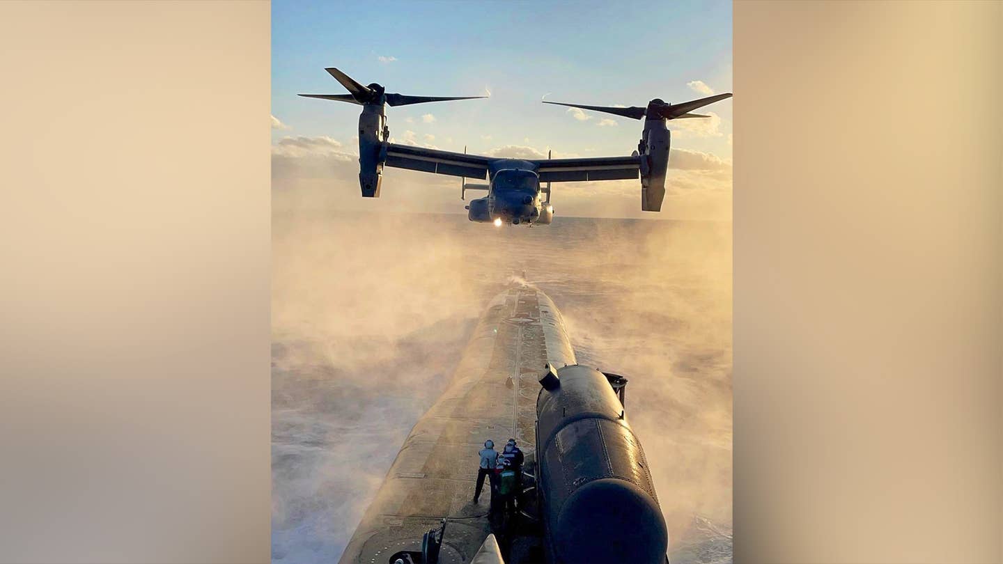 This Photo of a V-22 Osprey Hovering Over a Nuclear Submarine Is Nuts