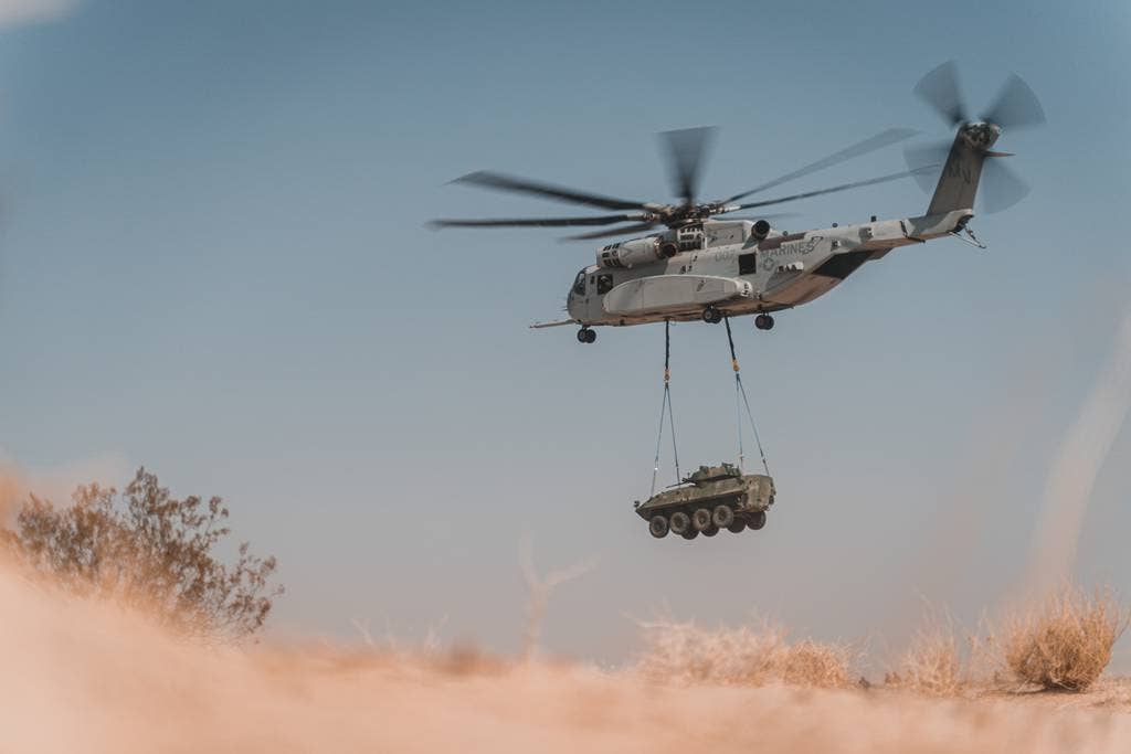A CH-53K lifts an LAV-25. (USMC)