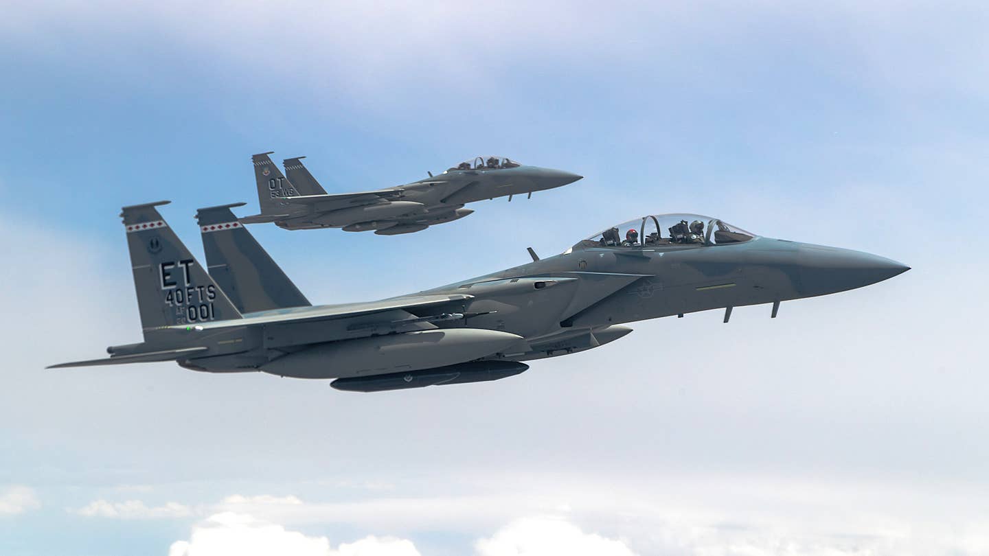The Air Force two F-15EX test jets fly together.
