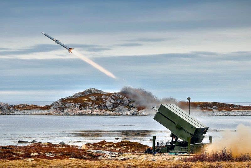 An AIM-120 missile flies from a NASAMS missile. <em>Kongsberg Defense</em>