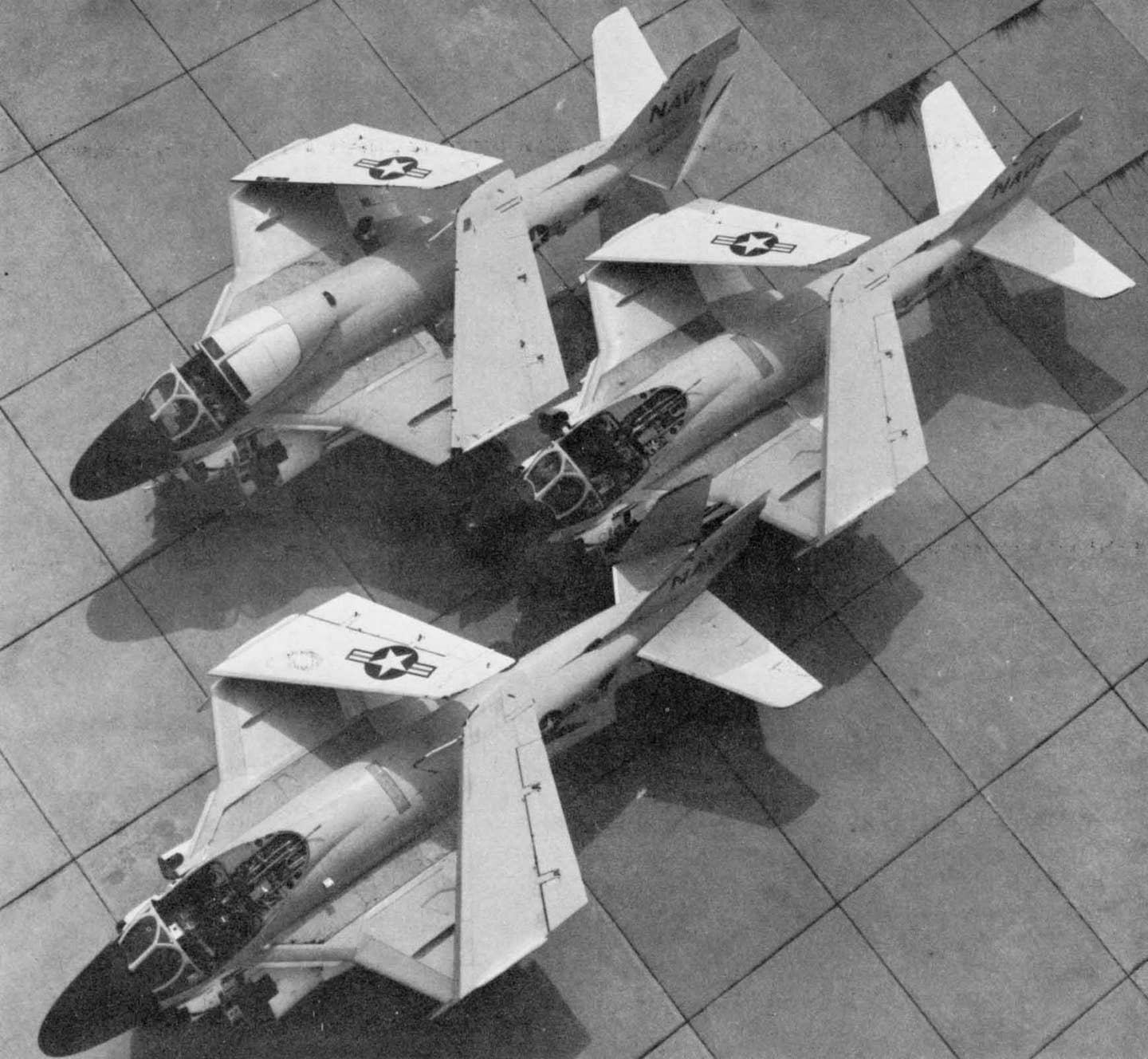 A Grumman demonstration of the folding horizontal tail concept to address issues with spot factor. Three A-6s were pulled off the production line, fitted with folding tails, and packed together as closely as possible. <em>Northrop Grumman</em>
