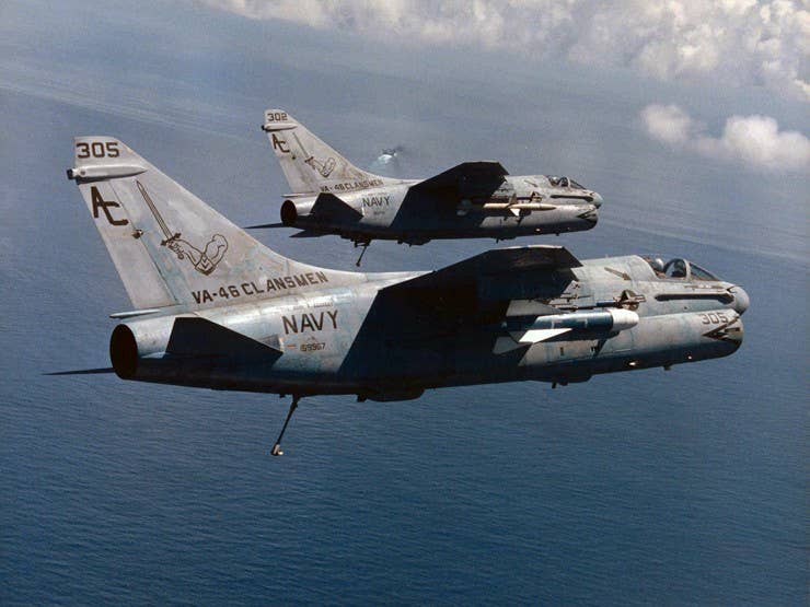 A pair of A-7E Corsair IIs of Attack Squadron 46 (VA-46), one of the last squadrons to operate the long-serving attack aircraft, returns to the aircraft carrier USS <em>John F. Kennedy</em> (CV-67) during Operation Desert Shield/Desert Storm. <em>U.S. Navy</em>