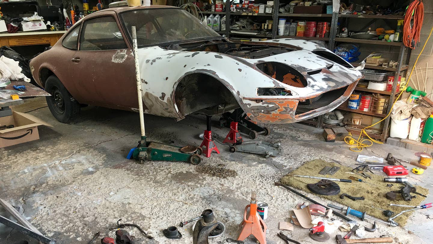 A dismantled Opel GT sports car.