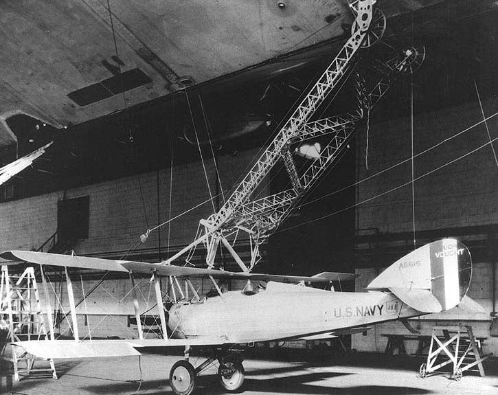 <br>A Vought UO-1 attached to the trapeze during mating experiments with the USS&nbsp;<em>Los Angeles</em>&nbsp;in the airship hangar at Naval Air Station Lakehurst, New Jersey, in December 1928. <em>U.S. Naval Historical Center&nbsp;</em><br>