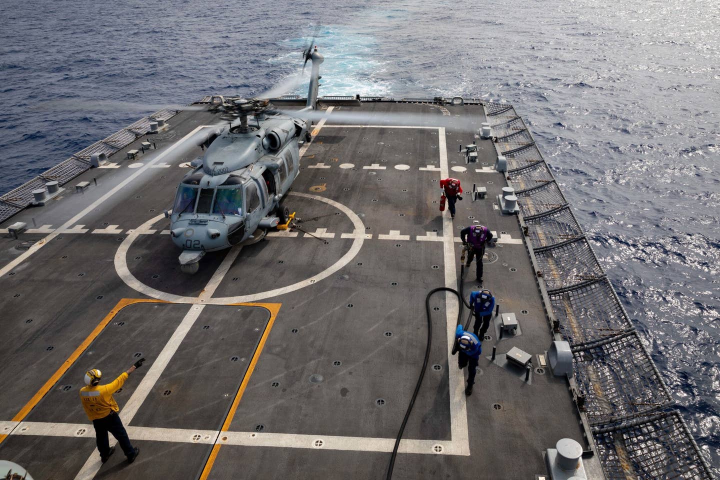 An MH-60S Seahawk helicopter from HSC-22 aboard USS Sioux City during a deployment in 2021. <em>U.S. Navy photo by Mass Communication Specialist 2nd Class Marianne Guemo/Released</em>