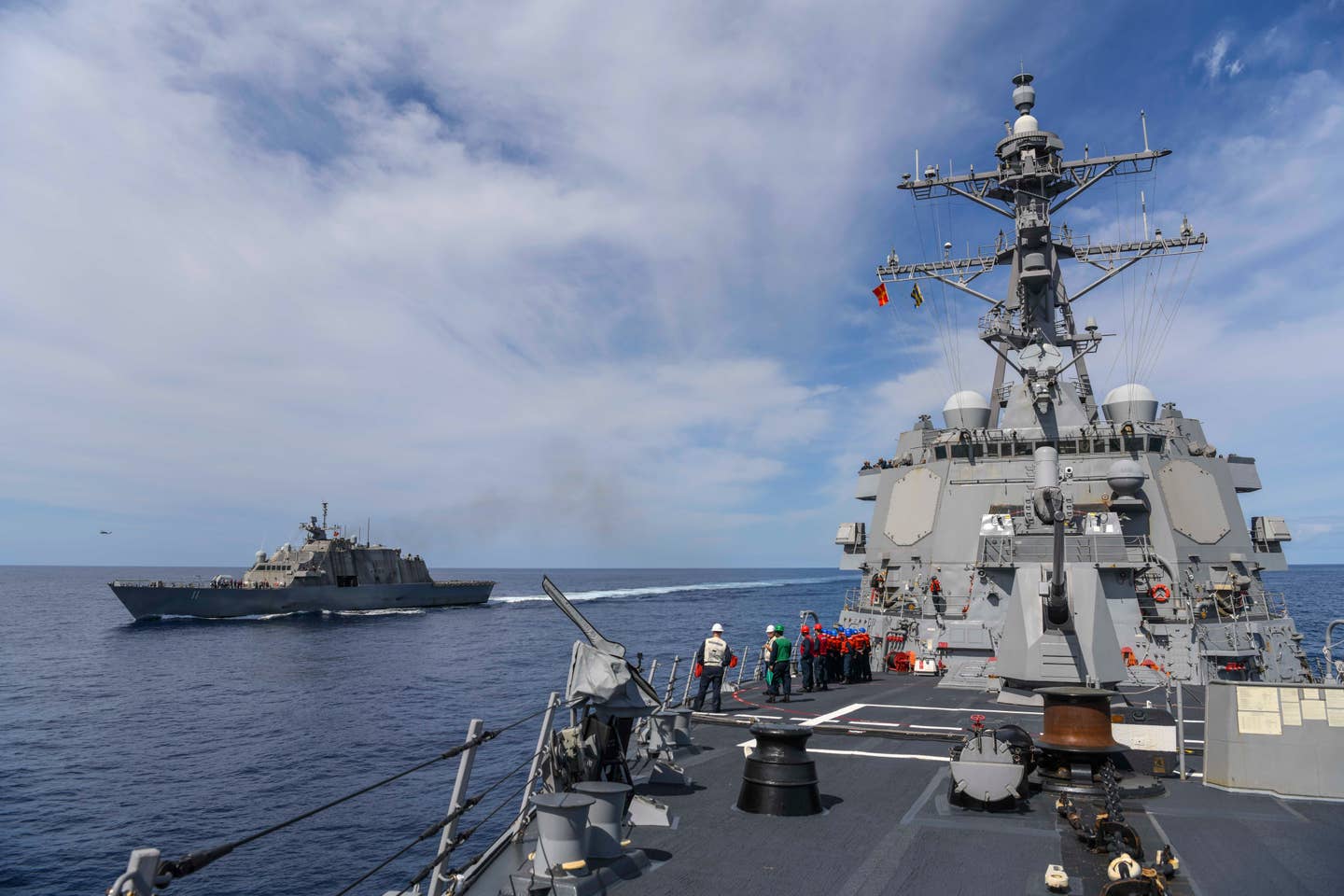 A picture of USS <em>Sioux City</em>, seen at left, sailing in the Atlantic, taken from the deck of the <em>Arleigh Burke</em> class destroyer USS <em>Paul Ignatius</em> on May 3, 2022. <em>U.S. Navy photo by Mass Communication Specialist 2nd Class Trey Fowler</em>