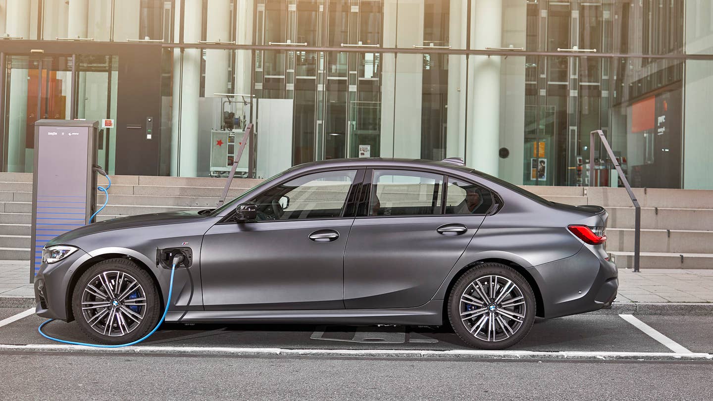 A BMW 330e hybrid charges up.