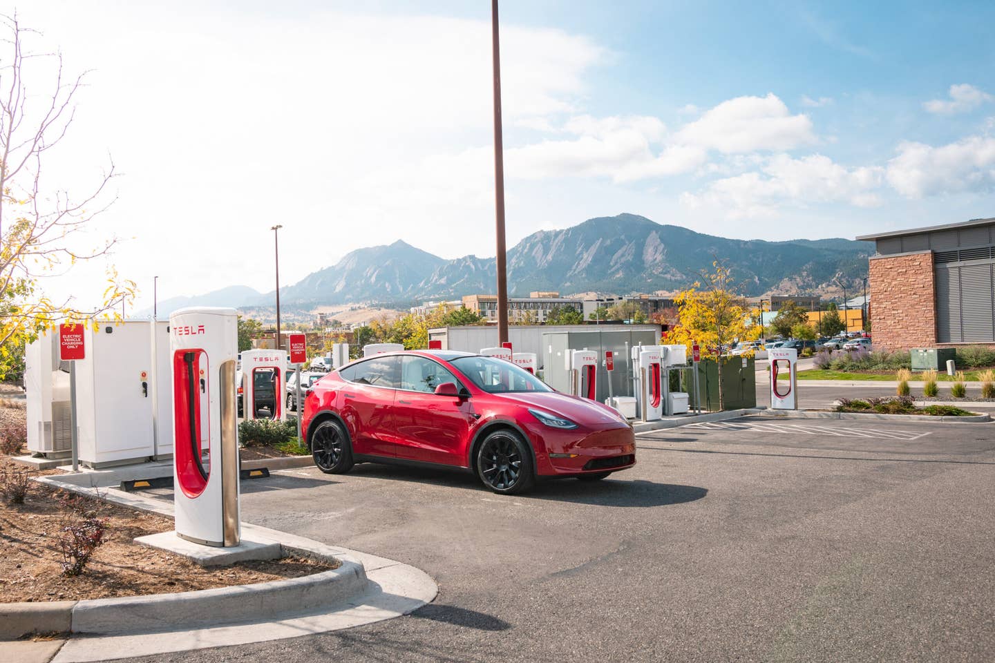 A Tesla charges at a public Supercharger location.