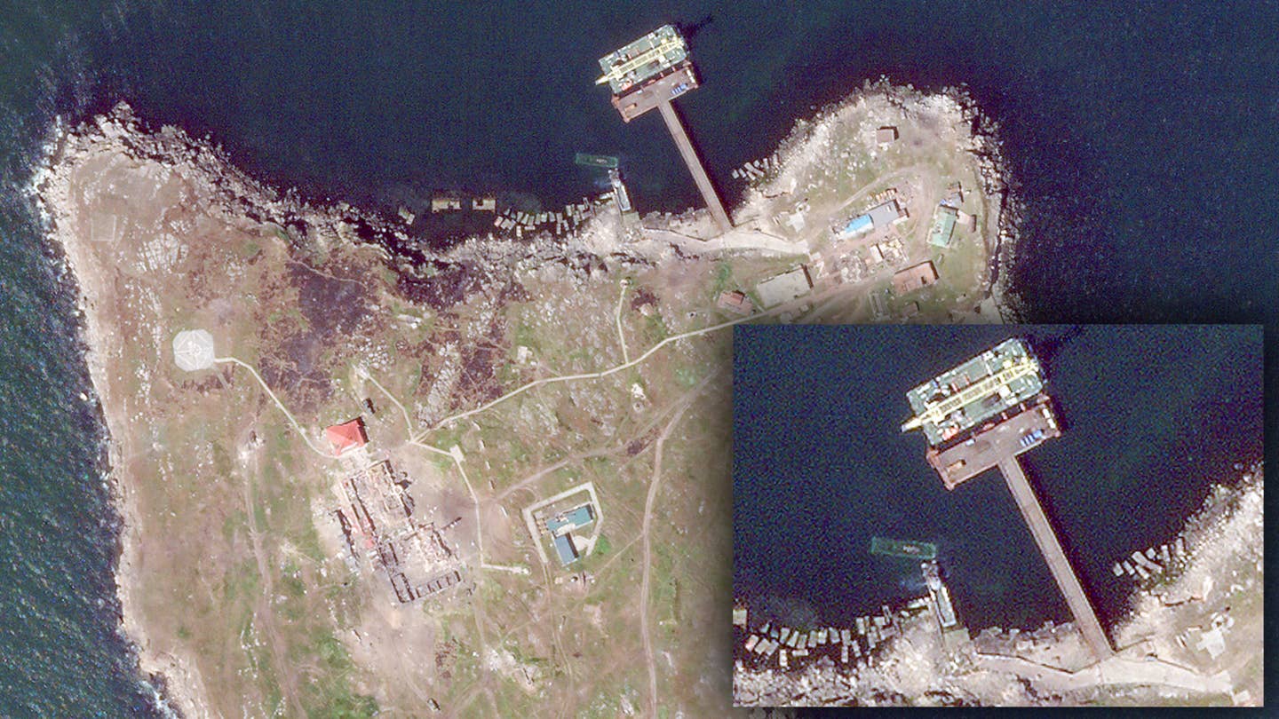 A satellite image of Ukraine's Zmiinyi Island, or Snake Island, taken on May 12, 2022, with an inset highlighting the presence of what is likely the Russian Navy's self-propelled crane barge SPK-46150.