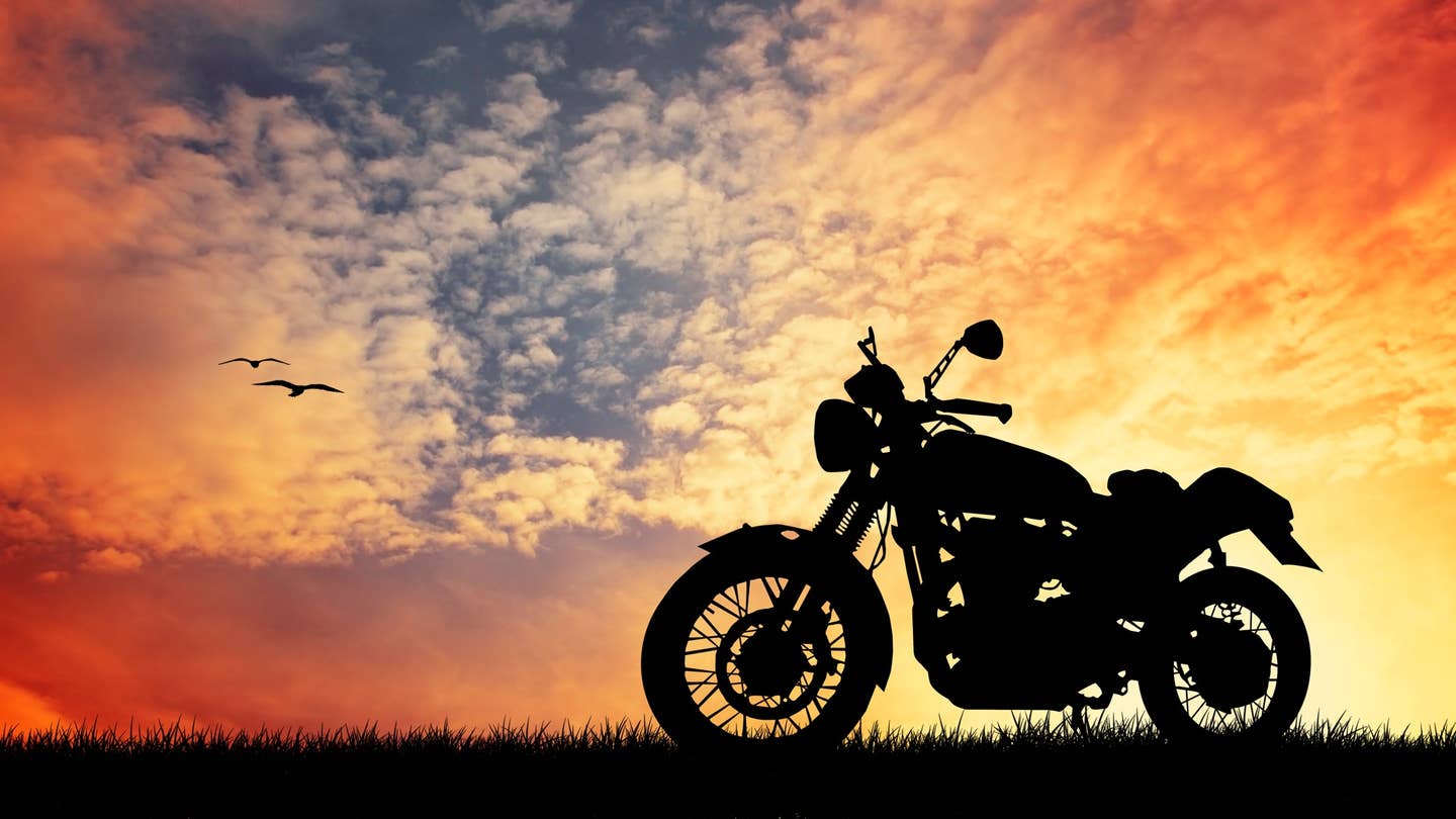 A motorcycle and sunset.