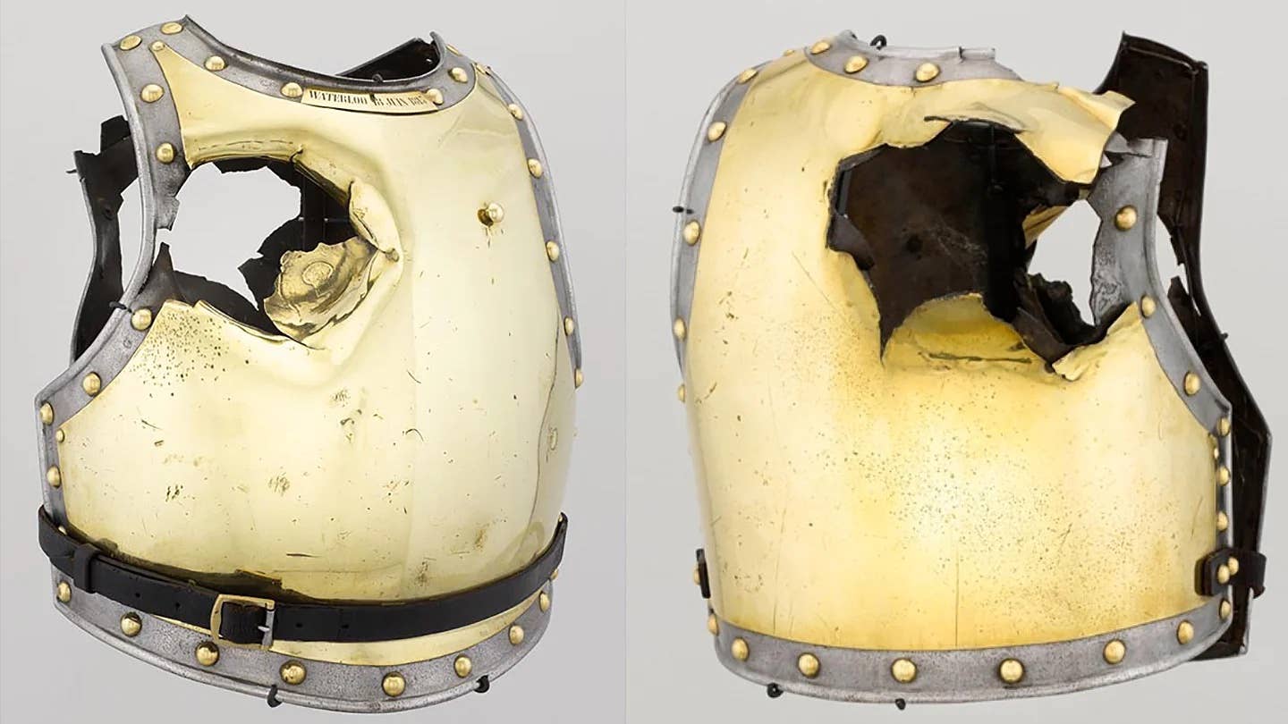 A direct hit from a 4-inch projectile killed the soldier wearing this armor at Waterloo in 1815. <em>Musée de l'Armée</em>