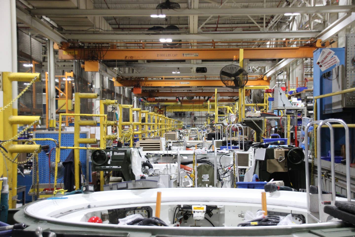 A look down the M1 Abrams assembly line at the Joint Systems Manufacturing Center-Lima, commonly called the Lima Army Tank Plant, in Ohio. <em>U.S. Army Tank-automotive and Armaments Command photo by Brian Hahn</em>