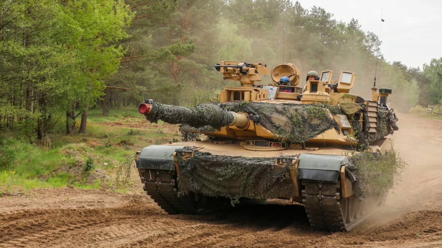 A U.S. Army M1A2 Abrams tank assigned to the 3rd Armored Brigade Combat Team, 4th Infantry Division, moves to their fighting positions during a multinational field exercise during Defender Europe 2022, Drawsko Pomorskie, Poland, May 15, 2022. Defender Europe 22 is a series of U.S. Army Europe and Africa multinational training exercises in Eastern Europe. The exercise demonstrates U.S. Army Europe and Africa’s ability to conduct large-scale ground combat operations across multiple theaters supporting NATO. (U.S. Army photo by Sgt. Andrew Greenwood)