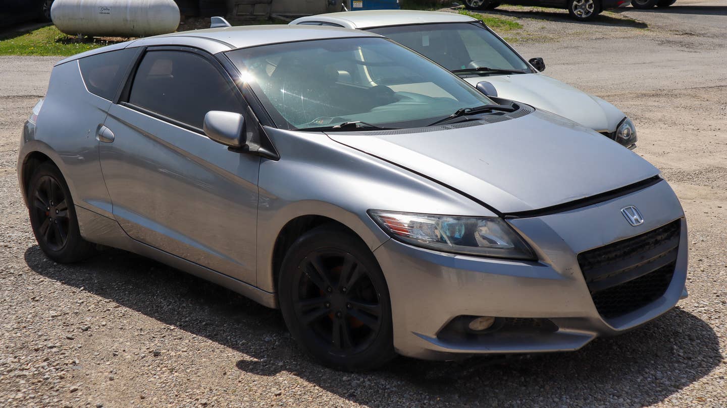 Honda CR-Z parked with hood open