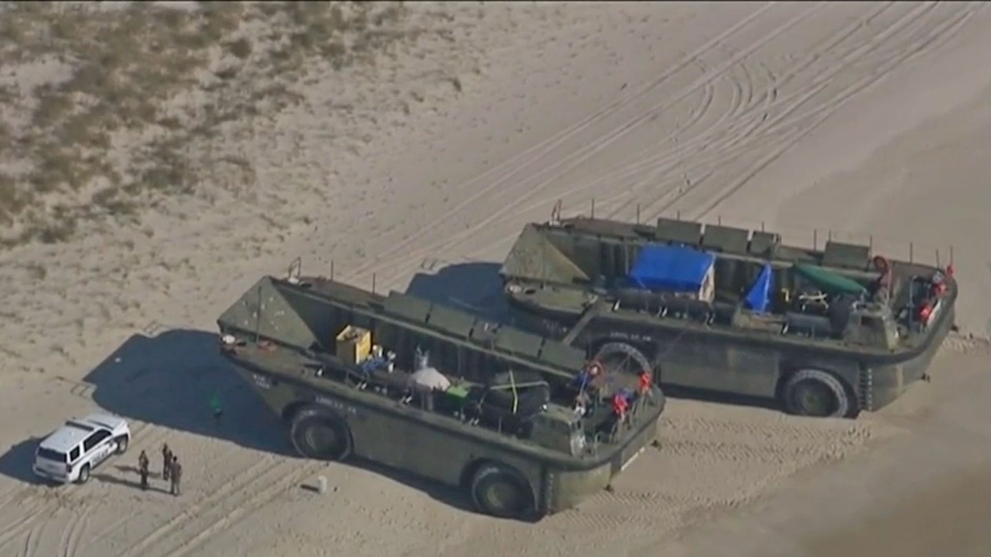 two LARC-LX amphibious vehicles stopped on a New Jersey beach.