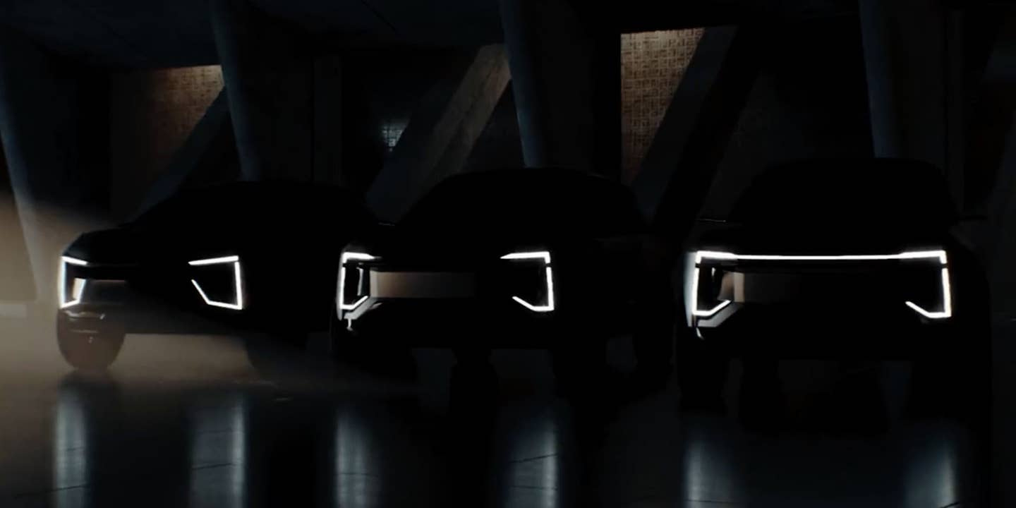 The teaser image of three shadowy SUVs that Mahindra showed earlier in 2022