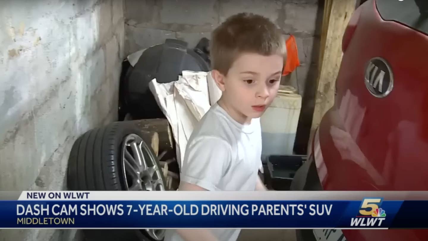 A 7-year-old boy takes family car