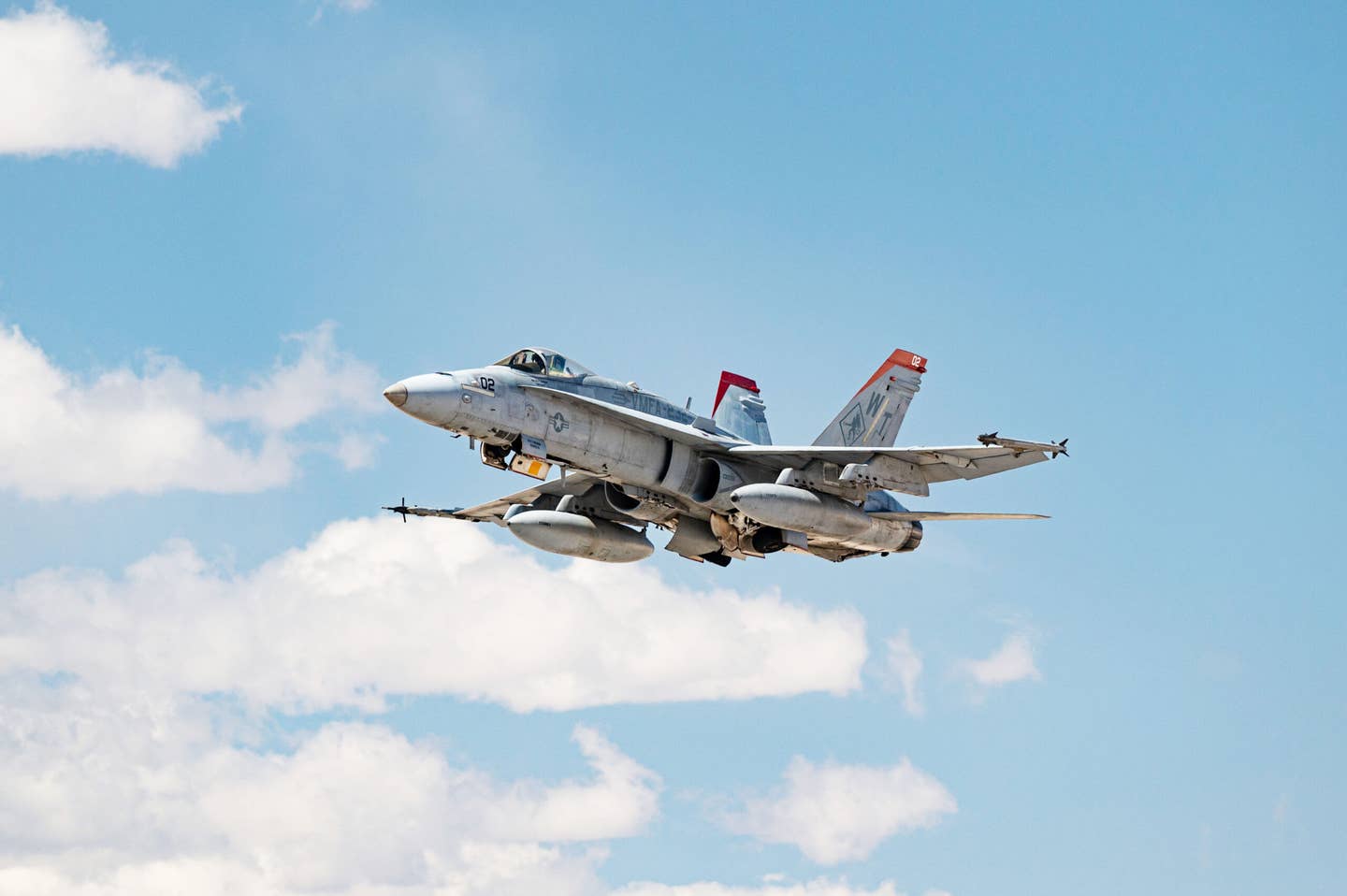An F/A-18C Hornet assigned to Marine All Weather Fighter Attack Squadron 323 takes off to participate in Black Flag 22-1, Nellis Air Force Base, Nevada, May 11, 2022. <em>U.S. Air Force photo by Airman Trevor Bell</em>