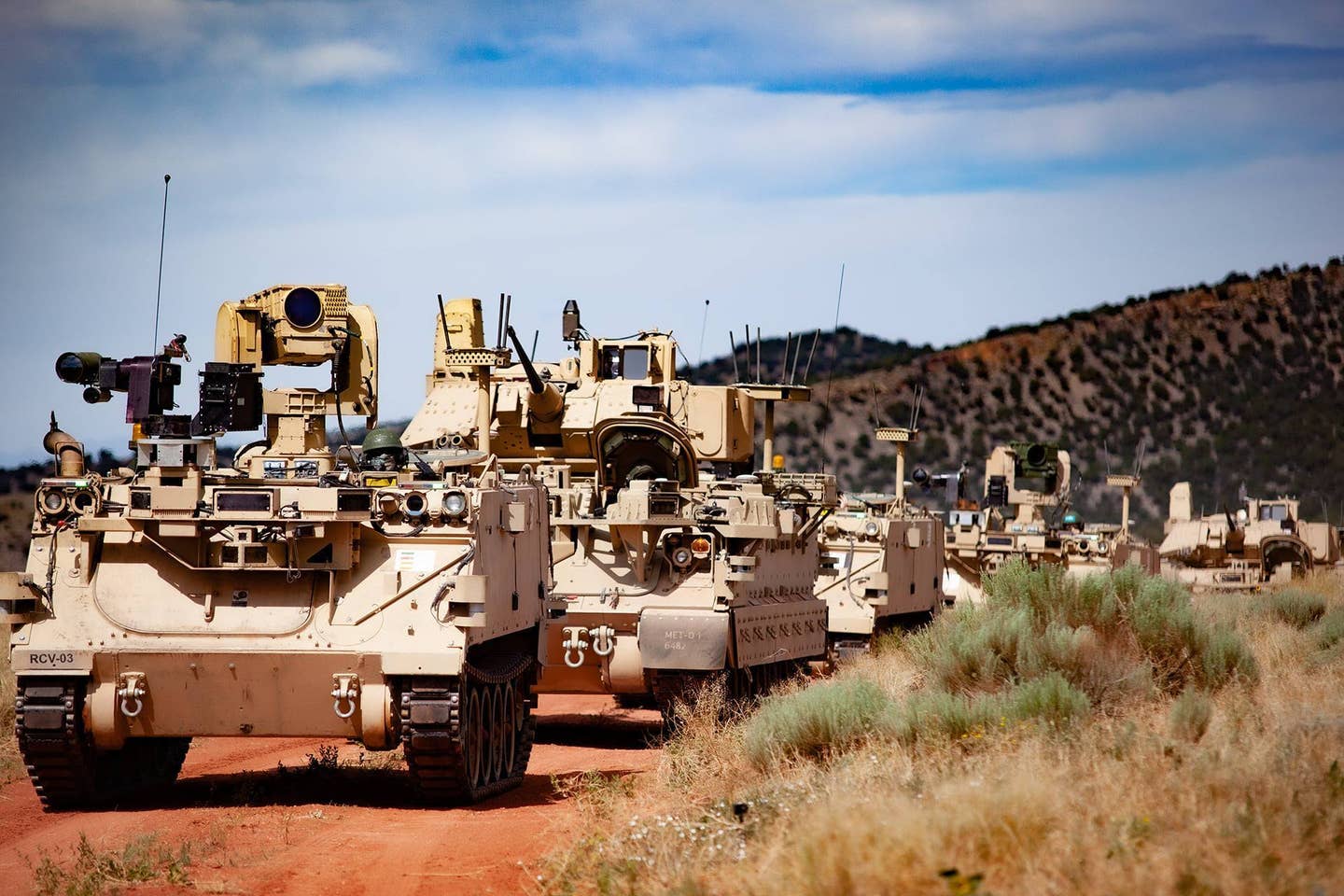 Modified Bradley Fighting Vehicles M113 tracked armored personnel carriers, or Robotic Combat Vehicles, were used to further develop the Manned Unmanned Teaming (MUM-T) concept at Fort Carson, Colorado in 2020. <em>U.S. Army photo by Jerome Aliotta</em>