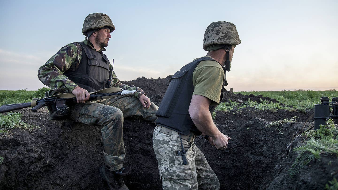 Ukrainian servicemen are seen in the trenches as fighting against Russian troops continues near to the Cherkaske City, on eastern Ukraine, May 3, 2022.