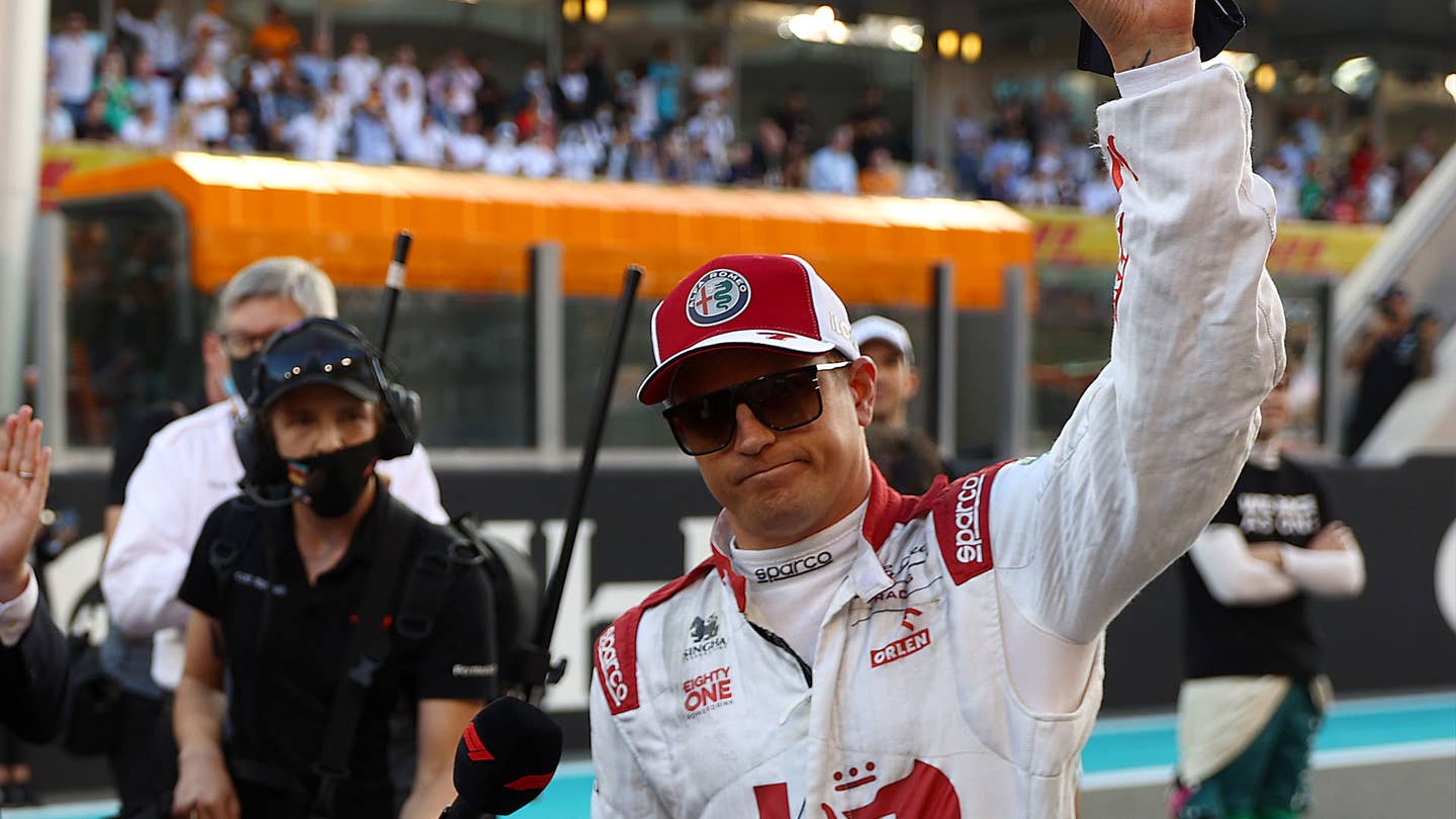 Kimi Raikkonen waving in the pit lane during the Abu Dhabi Grand Prix 2021