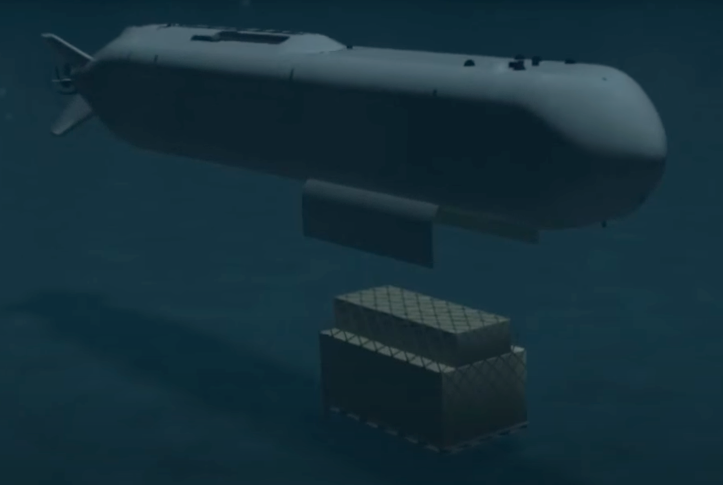 A screenshot from a video animation clip of an Orca placing something on the seafloor.<em> Boeing screencap.</em>