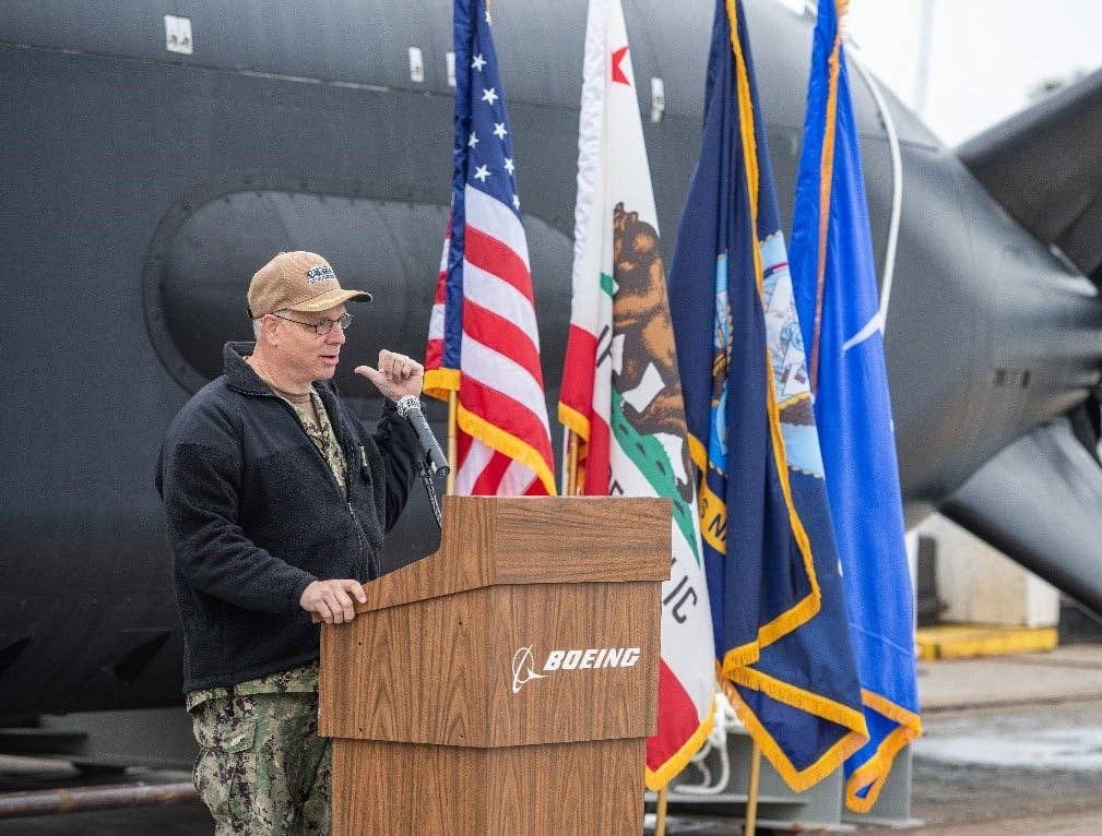 Capt. Scot Searles at the launch of the first of six Orca XLUUVs. NAVSEA
