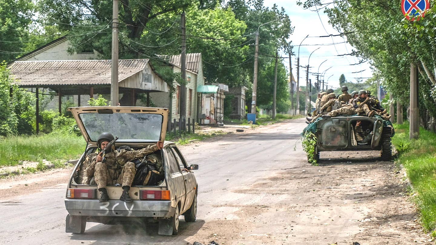 Soldiers seen moving on a tank and vehicles in the outskirts of the Lysychansk, close to Severodonetsk. Lysychansk is a city on the high right bank of the Donets River in the Luhansk region.