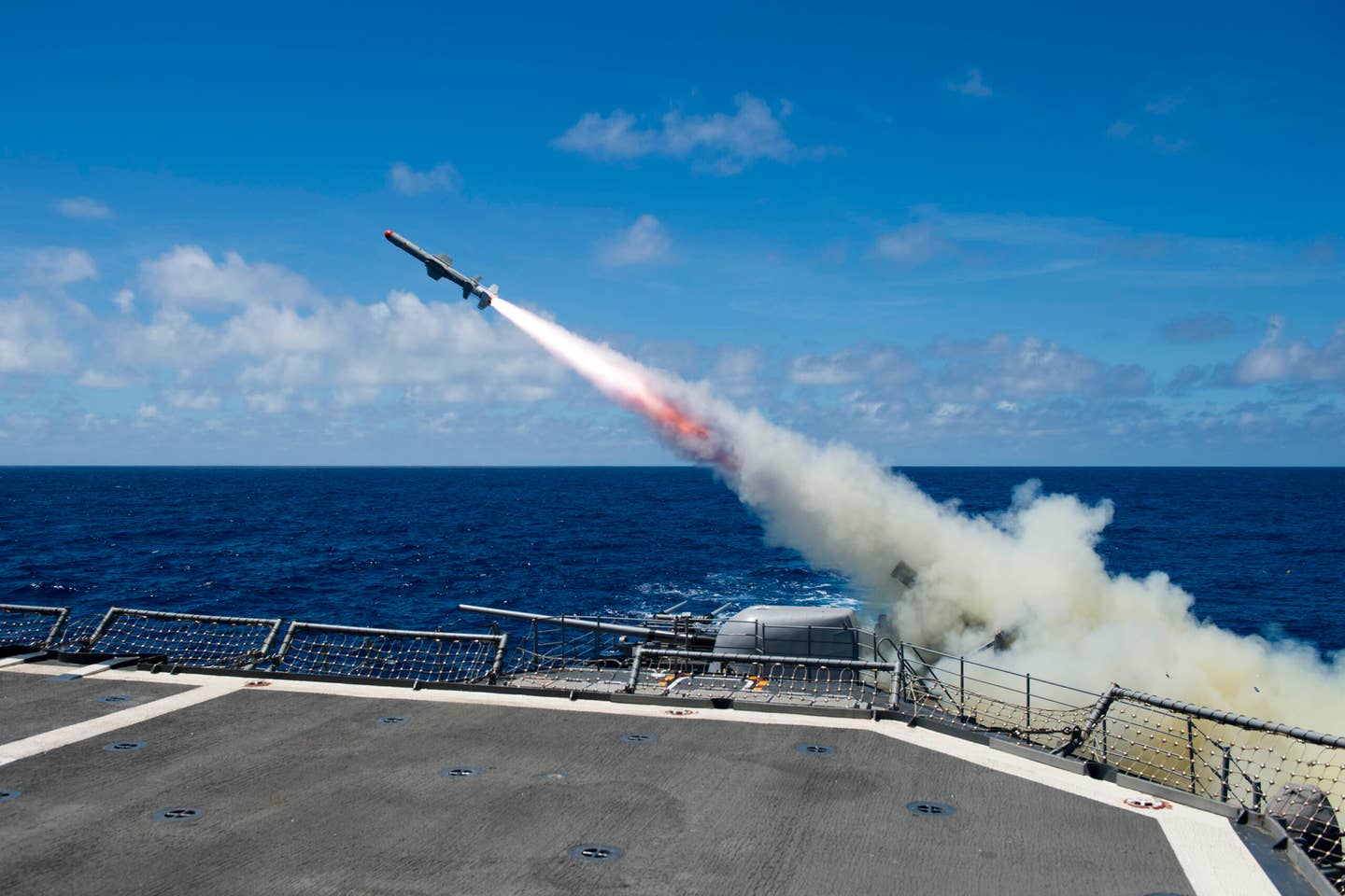 Sailors aboard the guided-missile cruiser <em>USS Princeton</em> fire an RGM-84 Harpoon anti-ship missile during an international sinking exercise. Mass Communication Specialist 1st Class Jason Noble/U.S. Navy