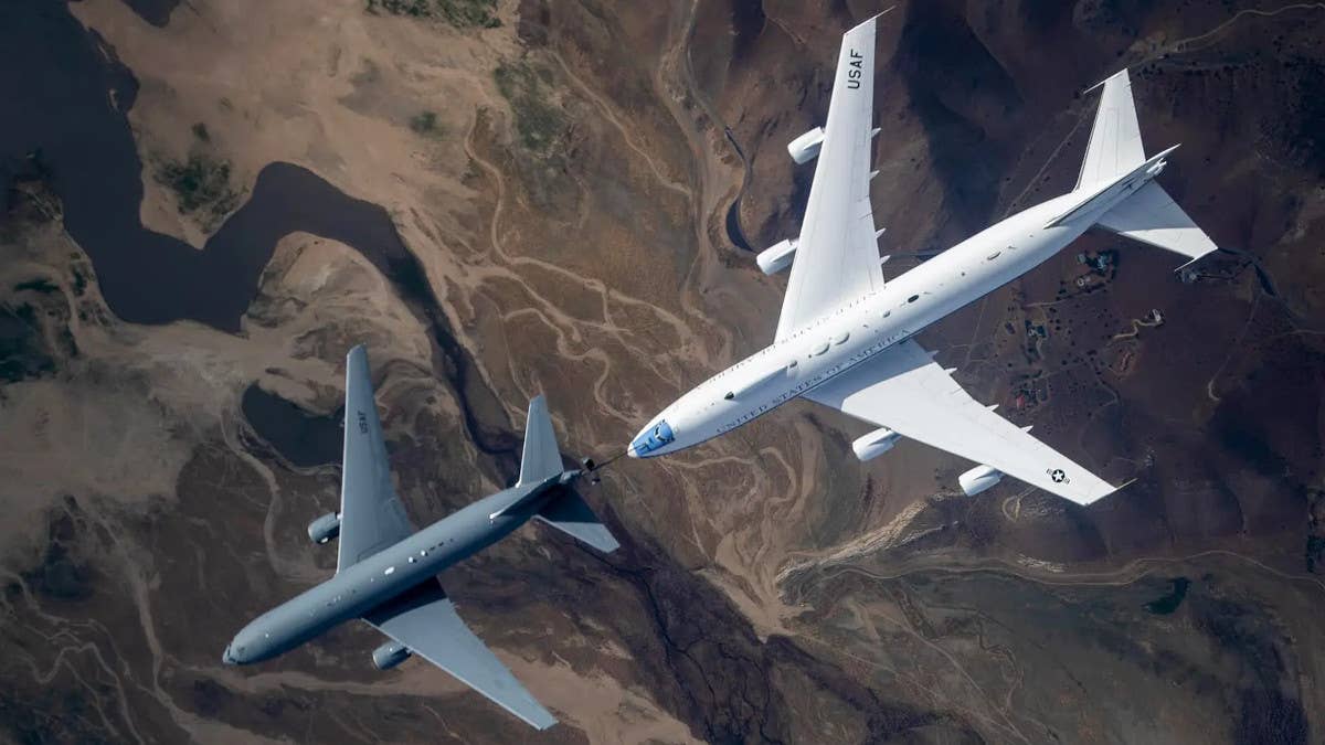 A KC-46 Pegasus carries out aerial refueling trials with an E-4B Nightwatch over Southern California. <em>U.S. Air Force</em>