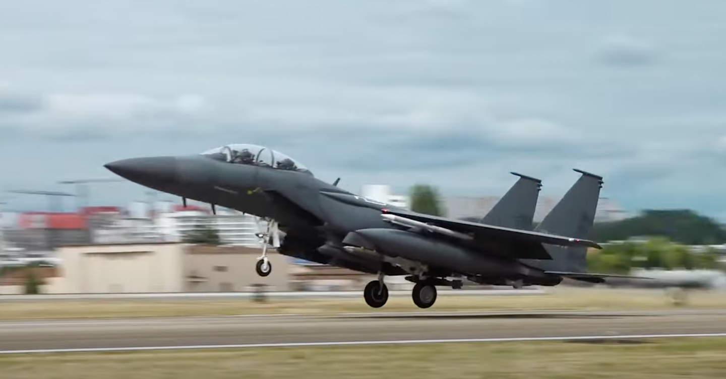 A ROKAF F-15K Slam Eagle takes off armed with AIM-120 AMRAAMs and Joint Direct Attack Munitions, or JDAMs. <em>Republic of Korea Ministry of Defense</em>