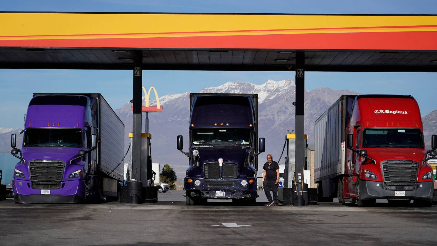 Trucks fuel up at the Love's Truck Stop in Springville, Utah, on December 1, 2021. - High fuel prices and a shortage of truckers have had a negative effect on the US supply chain. The US economy continues to struggle with supply issues that have pushed prices higher in recent weeks, but there are signs the strains may be easing, the Federal Reserve said on December 1.